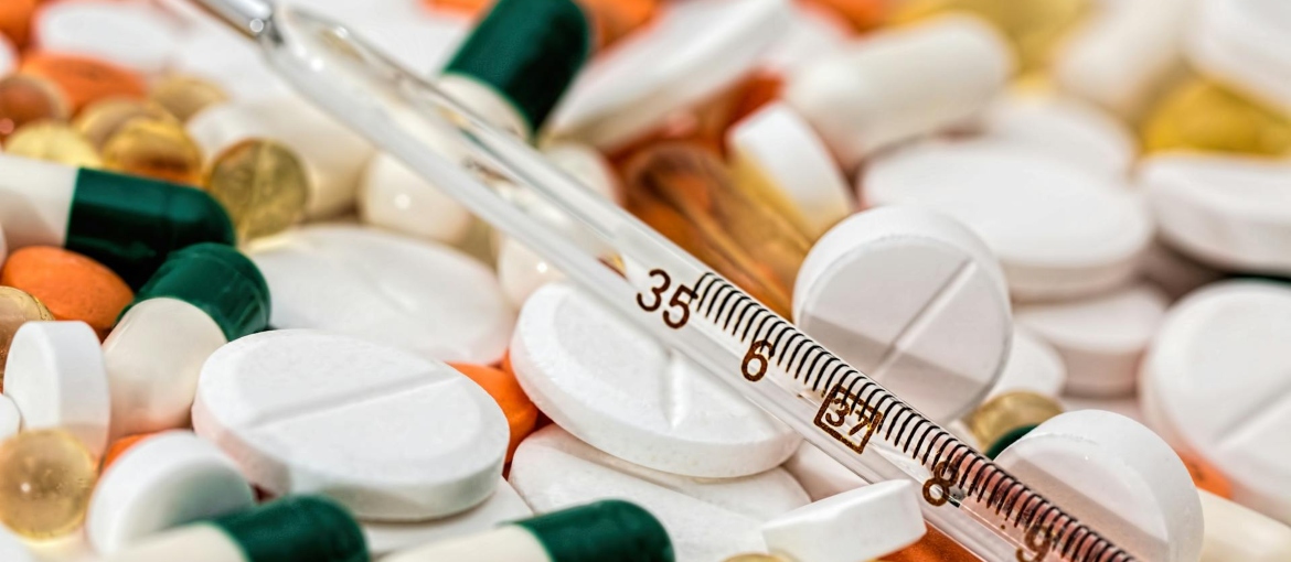thermometer on medical pills
