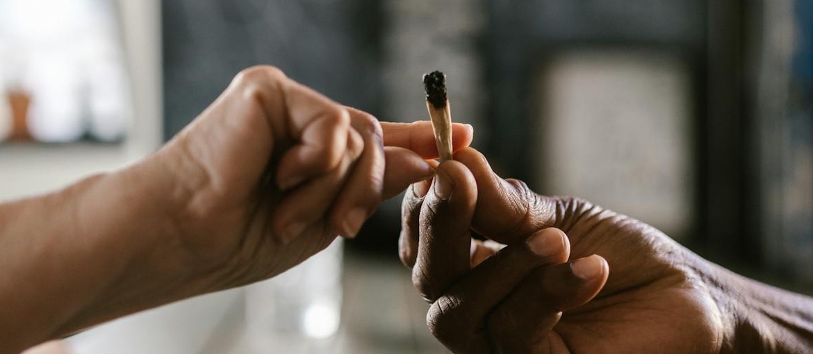 People passing a joint.