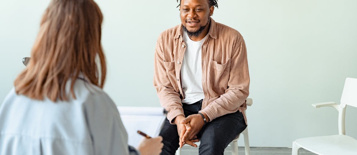 A man in psychotherapy addressing stages of meth addiction recovery.