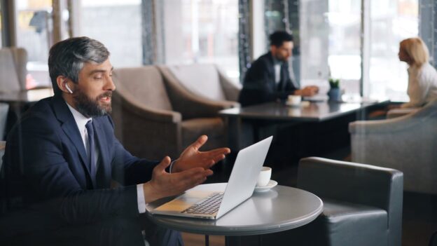 Businessman working in a café.