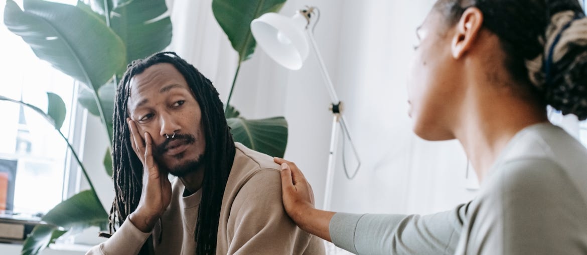 Woman supporting a man starting rehab.