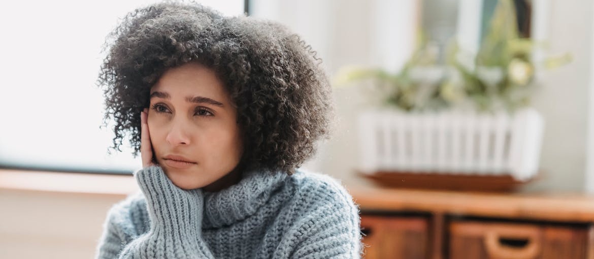 A person feeling depressed and thinking about getting professional cocaine addiction treatment