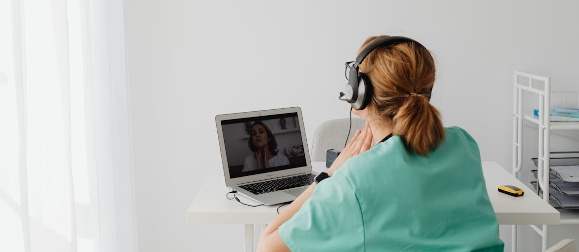 Therapist having a virtual therapy session with a patient.