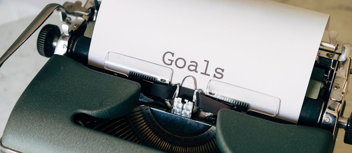 Goals written on a typewriter.