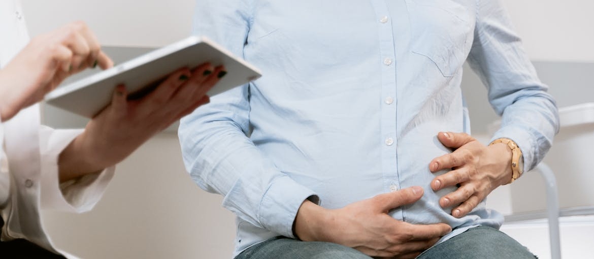 OB-GYN talking about being pregnant and hiding an addiction with her patient.