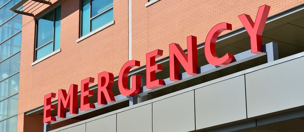 Emergency sign in front of a hospital.