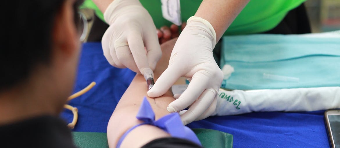 Person getting their blood drawn.