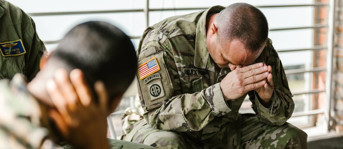 Veteran praying.