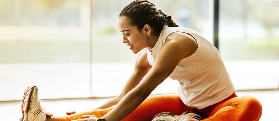 Woman stretching before exercising.