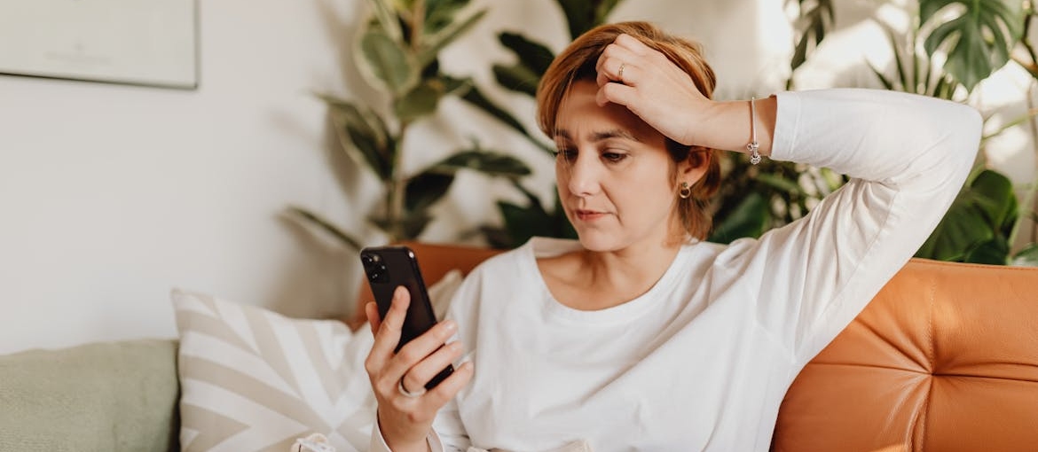Woman looking at her phone.