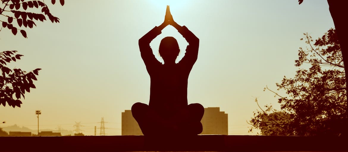Person meditating to help with long-term addiction recovery.