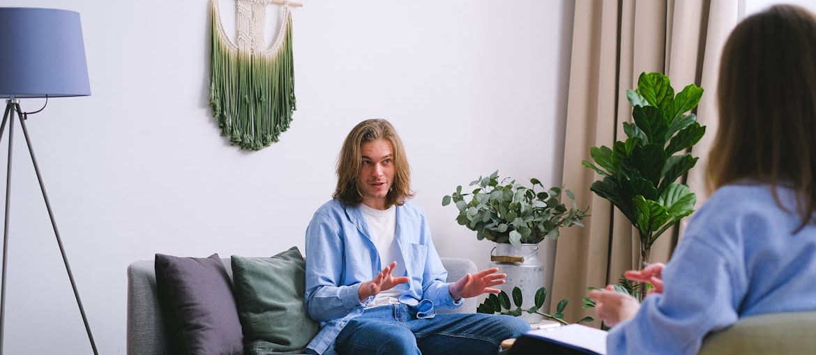 Man attending a therapy session.