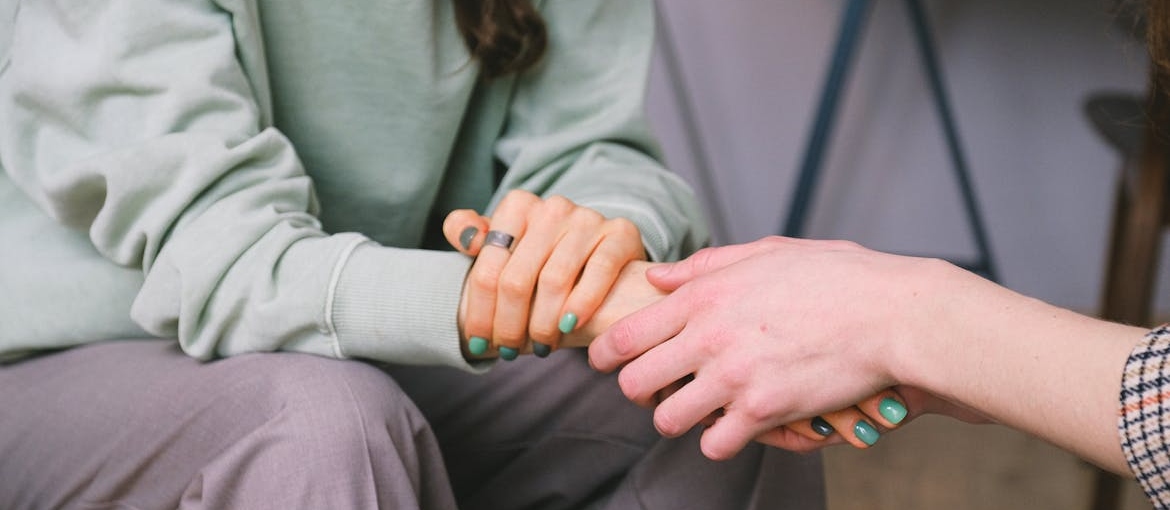 Woman supporting her friend through long-term addiction recovery.