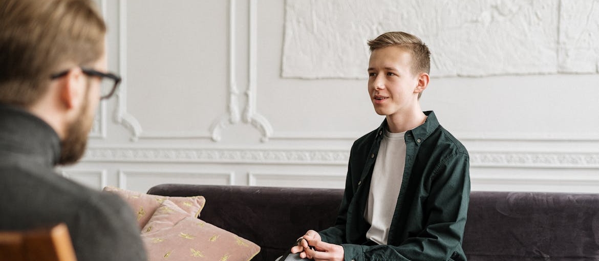 Young boy asking his therapist can you get seasonal depression in the summer?