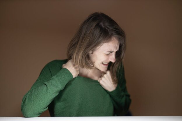 Angry woman experiencing dry drunk syndrome.