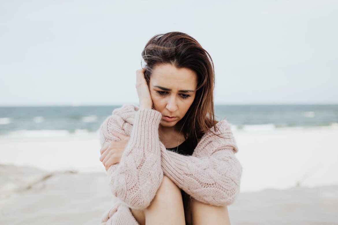 Woman experiencing seasonal depression in summer.