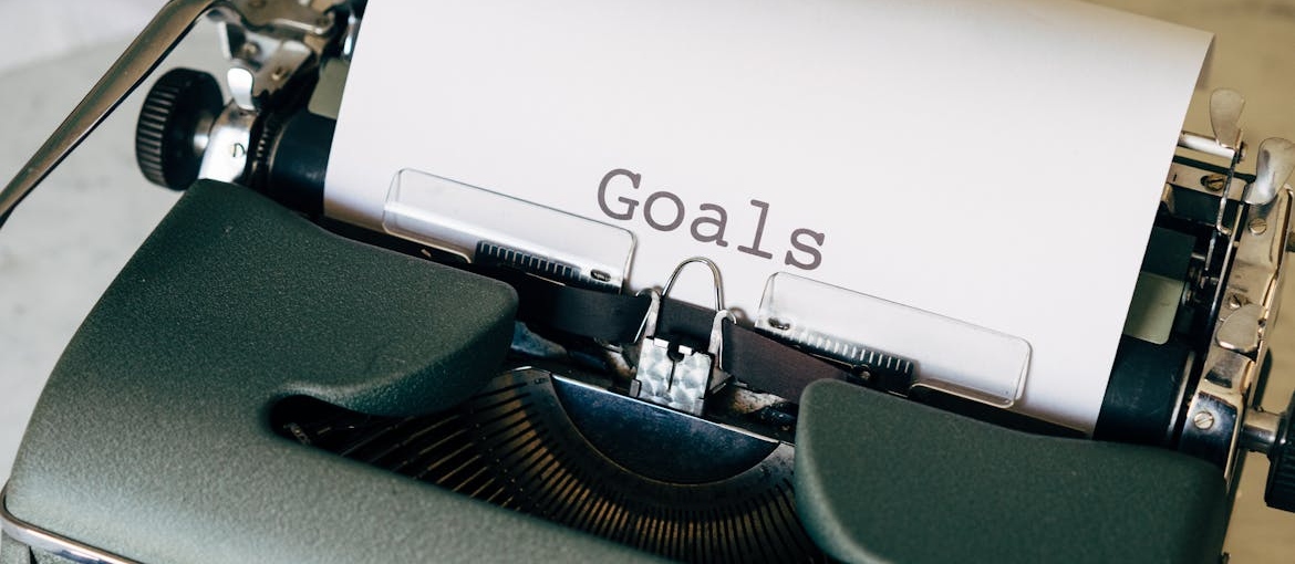 Goals written on a typewriter.