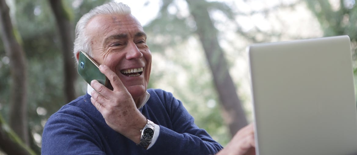 Man having a phone call with a rehab center.