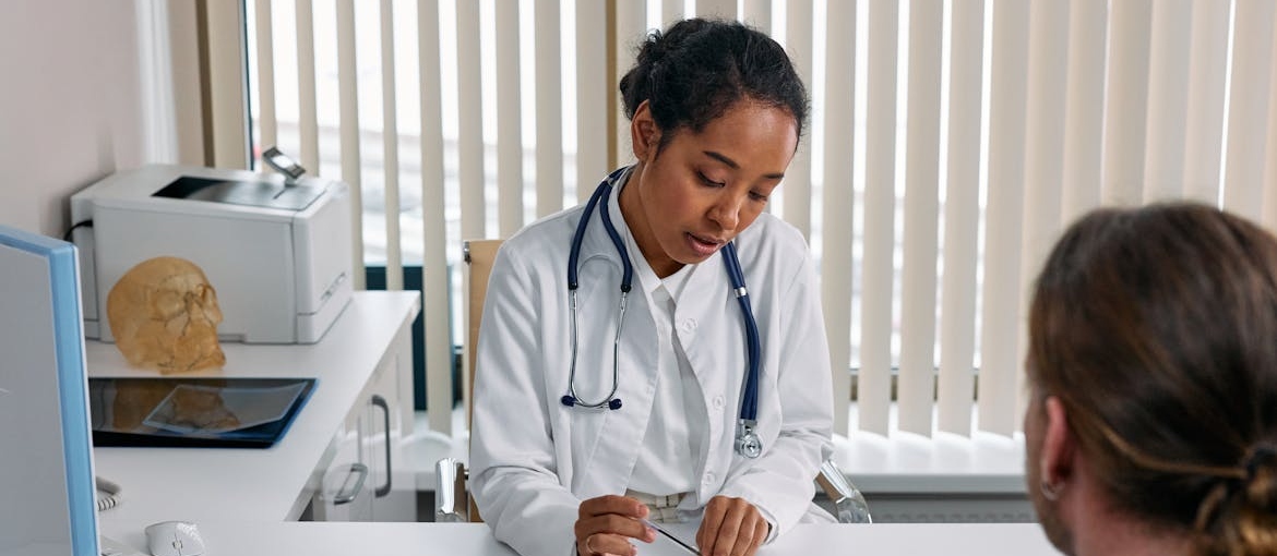 Doctor talking with her patient.