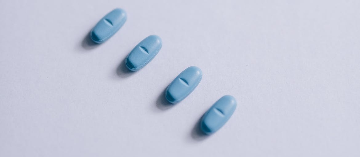 Four blue pills.