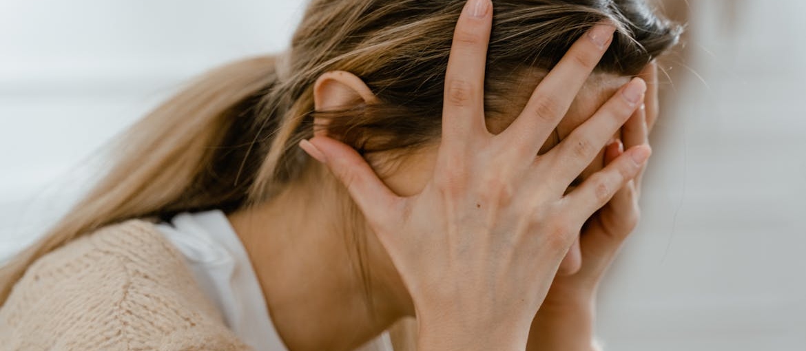 Woman dealing with negative thoughts about life after inpatient rehab.