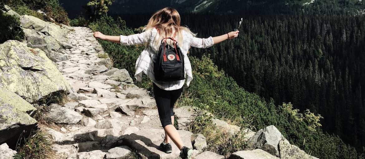 Woman hiking in the mountains.