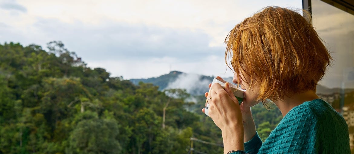 Woman drinking a cup of coffee.