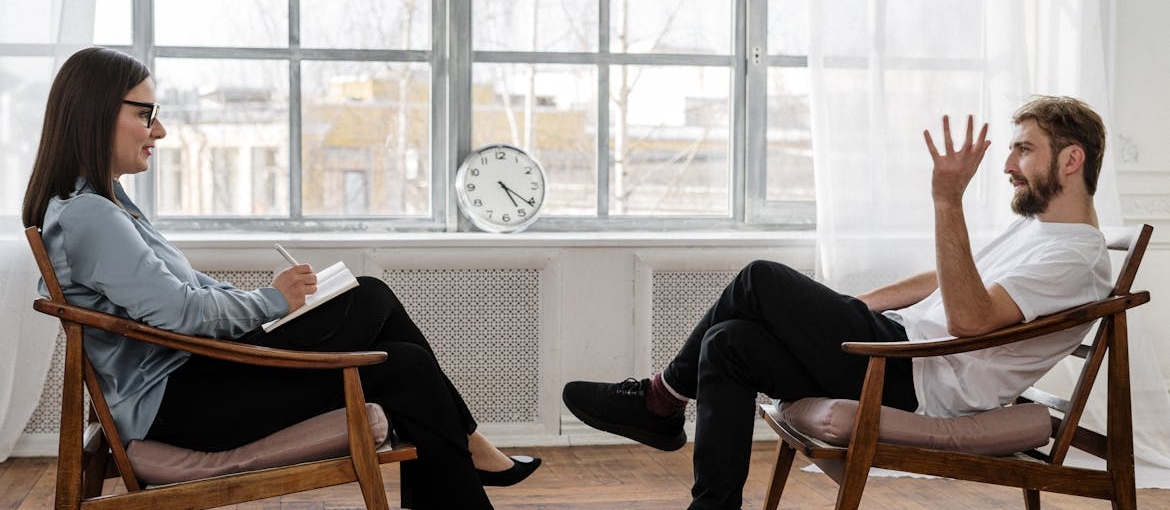 Man talking with his therapist.