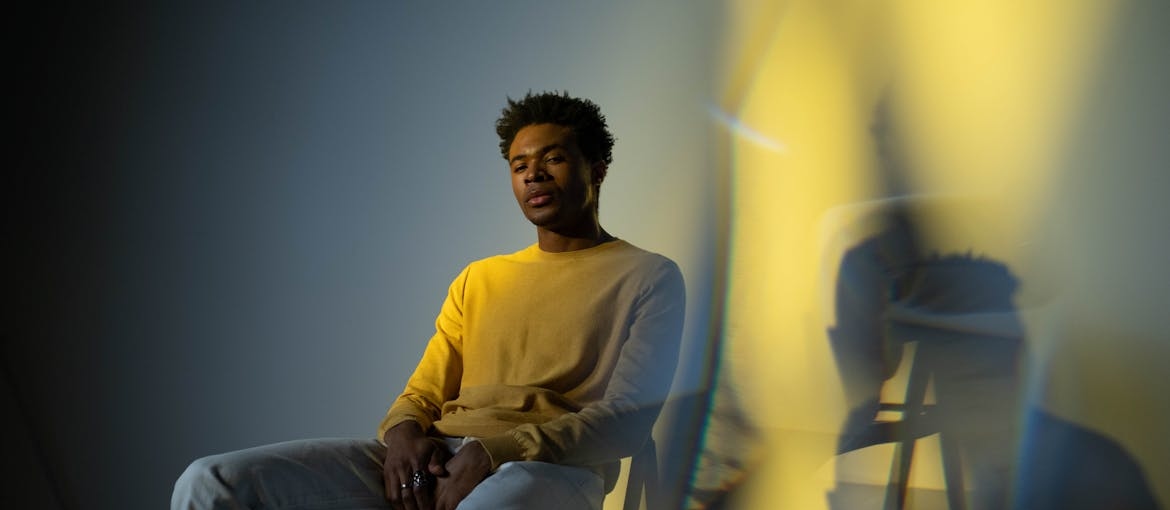 Man experiencing hallucinations after having tripped on acid.