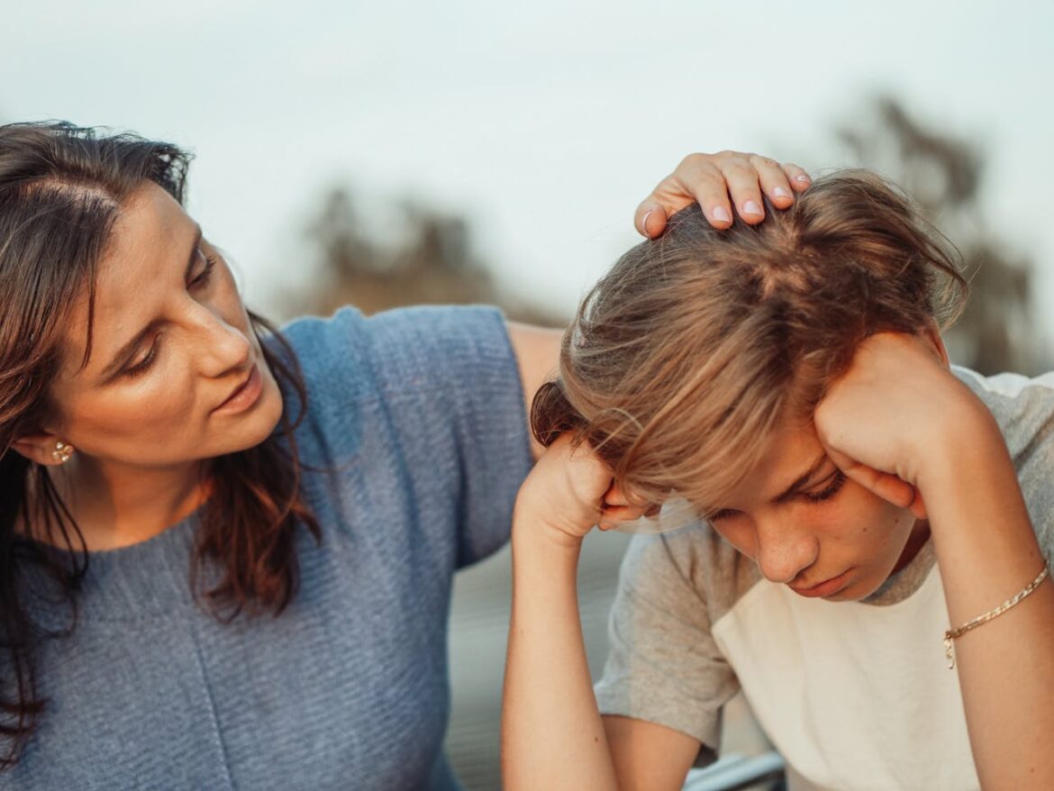 Woman supporting a teenage boy with addicted parents.