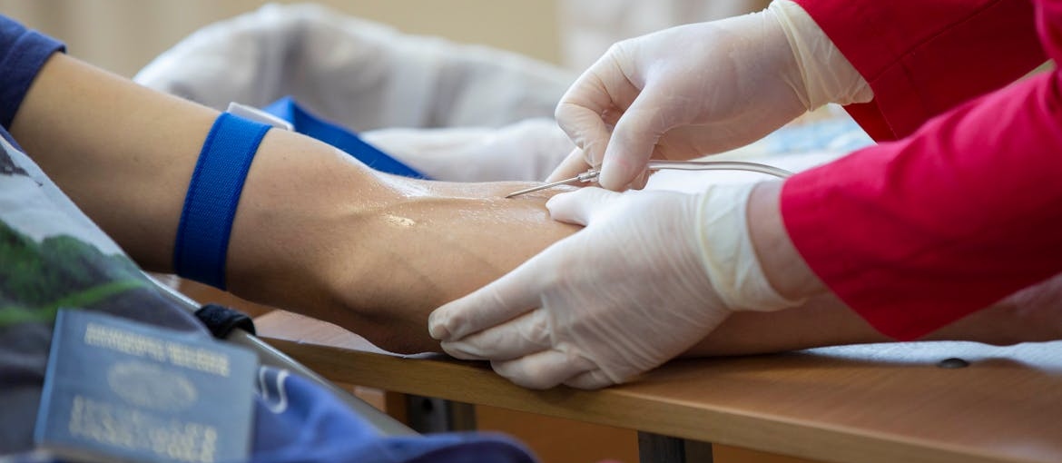 Person getting their blood drawn.