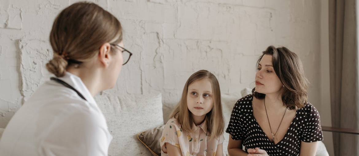 Young girl with addicted parents in therapy.