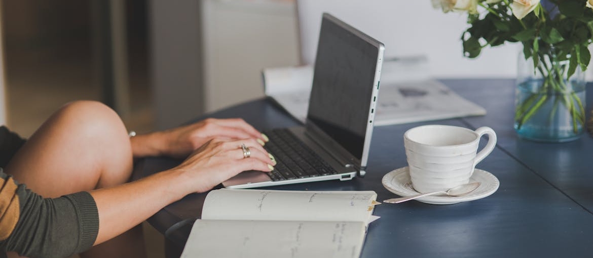 Woman researching rehab centers on her laptop.