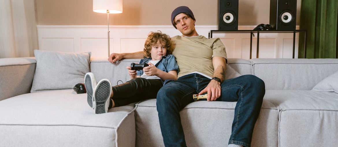 Man playing games with a boy.