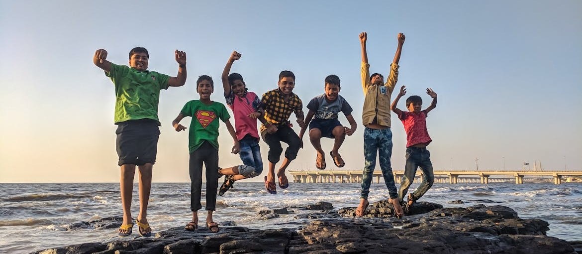 Group of kids having fun at the beach.