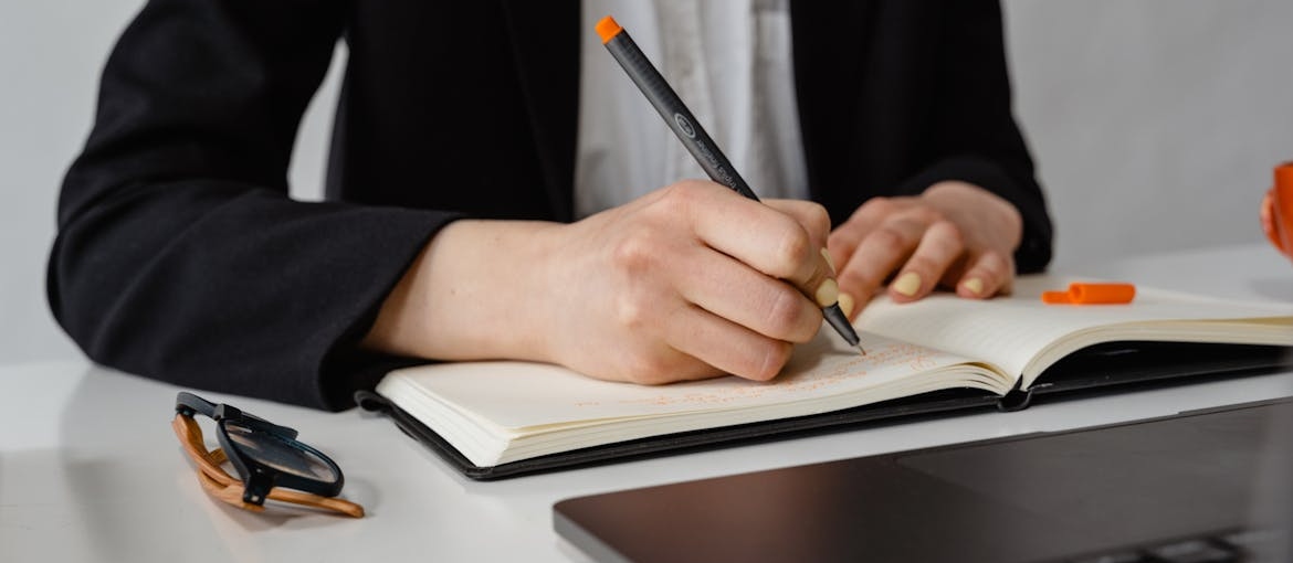 Woman journaling as a healthy alternative to substance abuse.