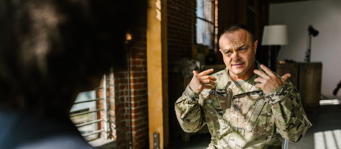 Man talking about transition from military to civilian life with a therapist.