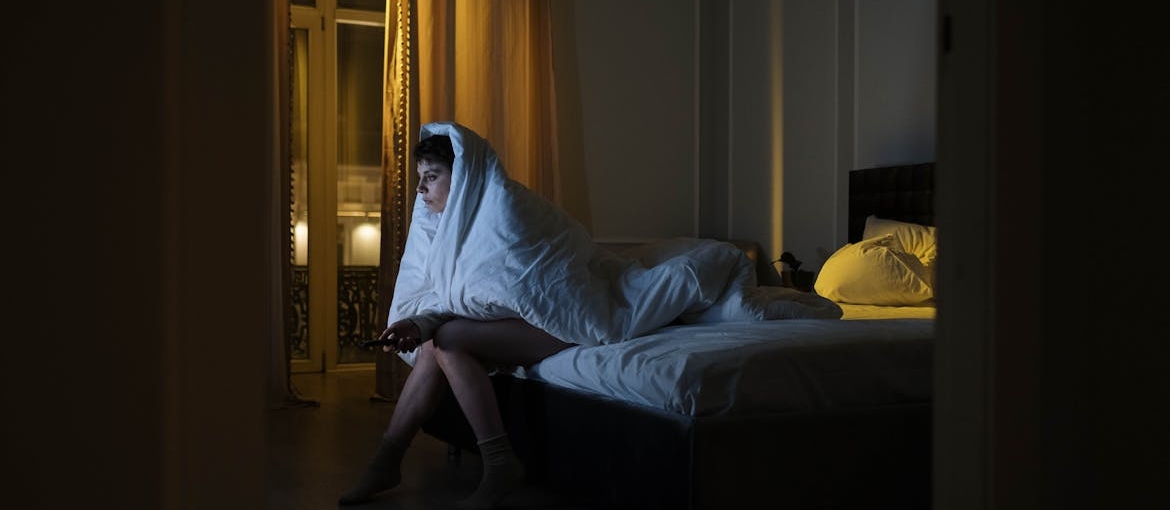 Woman experiencing insomnia due to cocaine use.