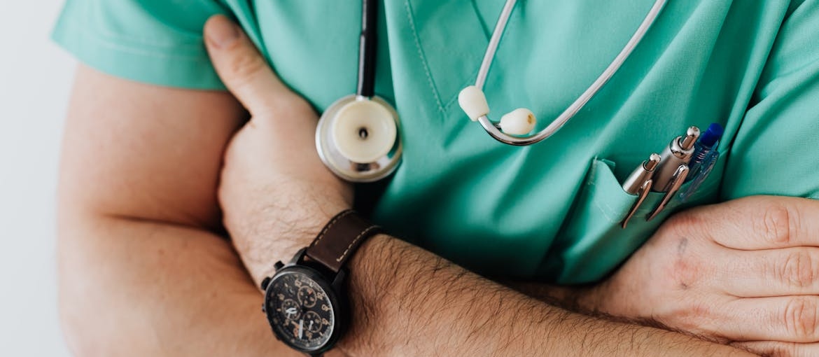 Doctor crossing his arms.