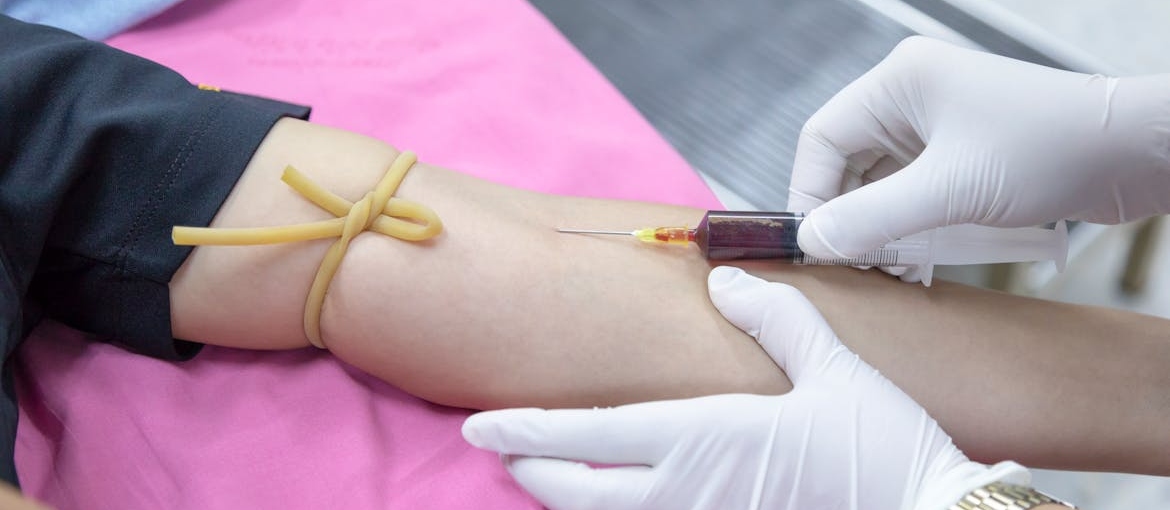 Woman getting her blood drawn for an opioid test.