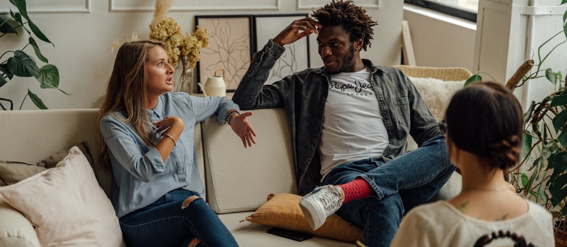 Couple talking with their therapist.