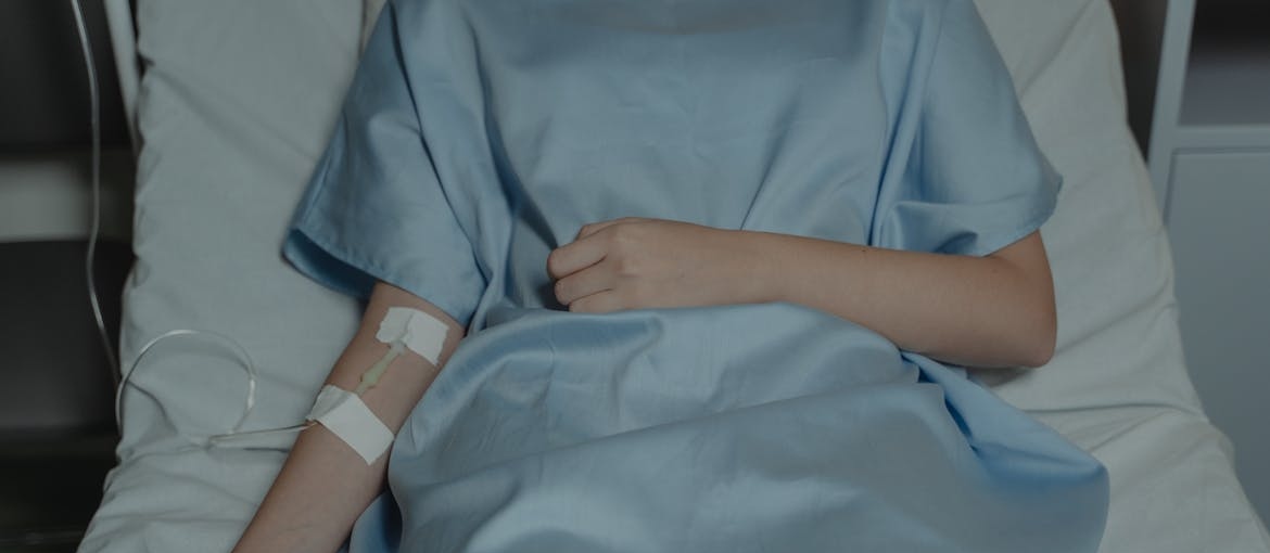 Person getting an IV during medical detox.