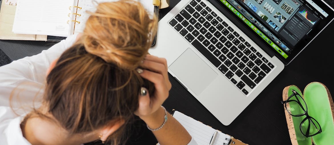 Woman worrying about is Tramadol addictive while working.