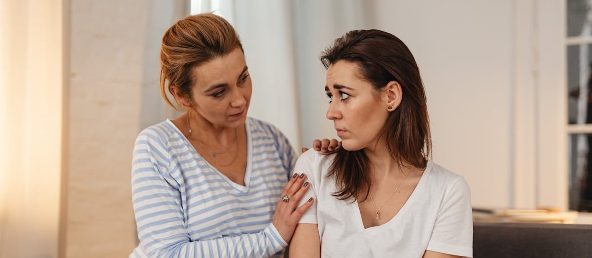 Woman supporting her friend who is struggling with relapse.