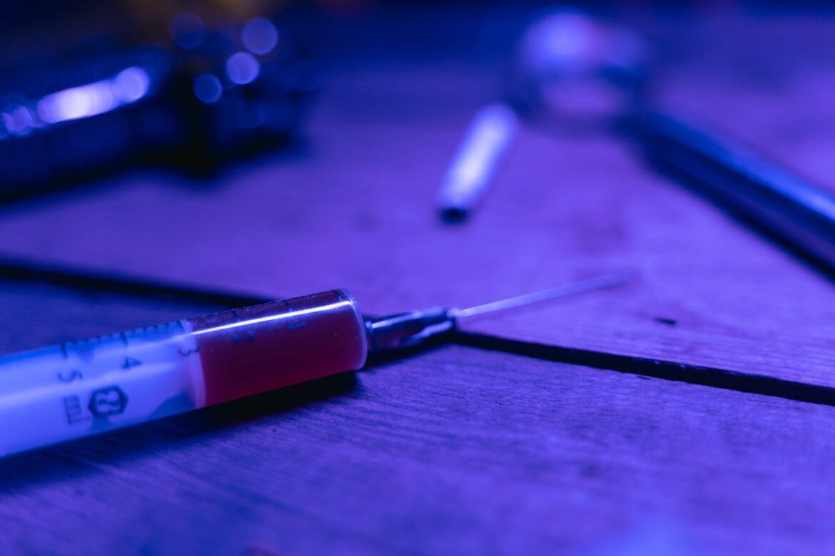 Fentanyl laced heroin in a syringe on a table.