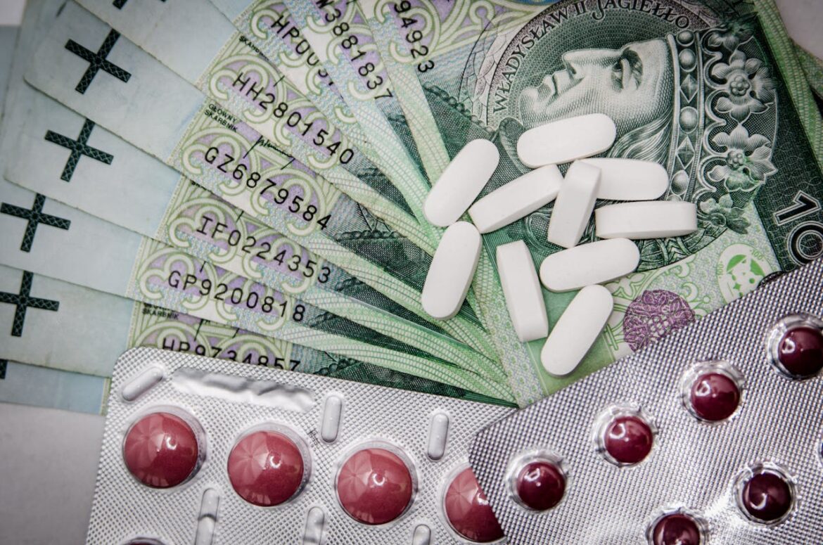 Pills on top of money bills.