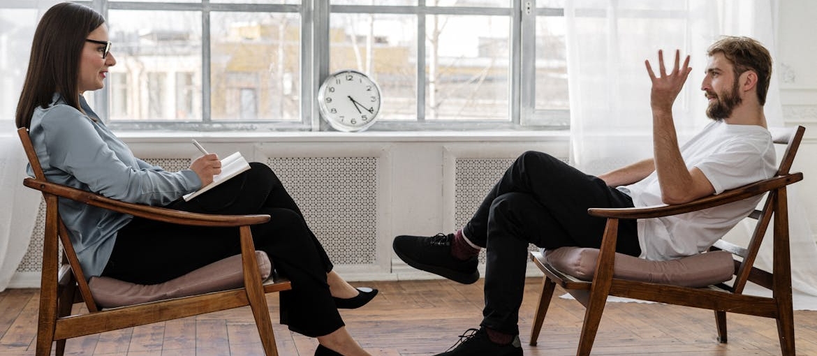 Man talking with his therapist.