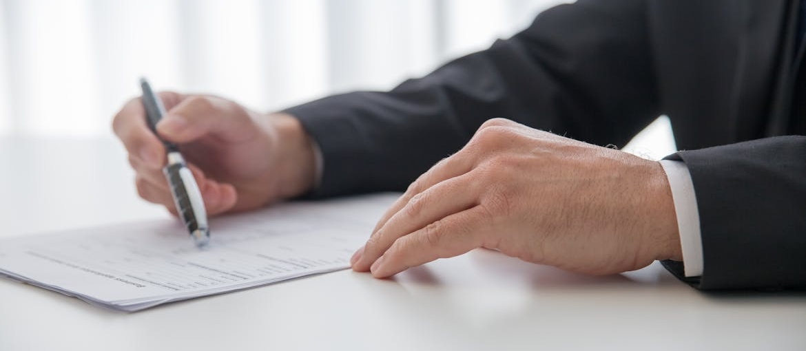 Person reviewing a document.