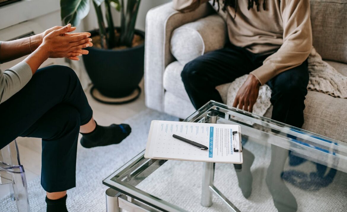 Therapist talking with her client.