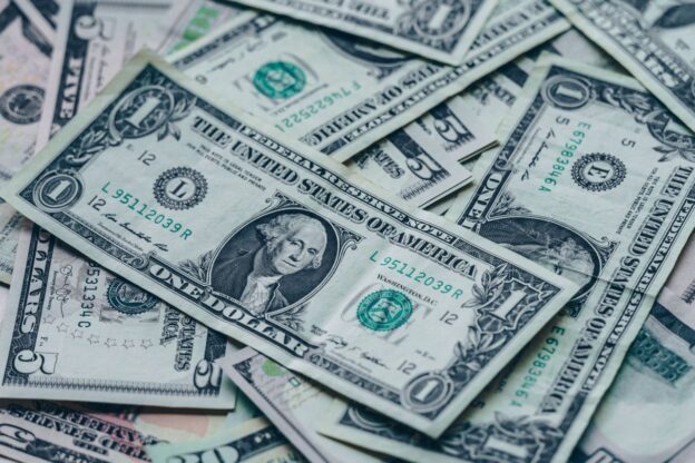 One dollar bills.
